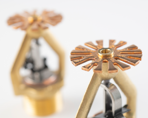 A set of gold fire sprinklers